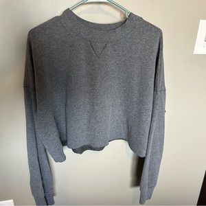 Women’s grey crew neck sweatshirt. Cozy and cropped